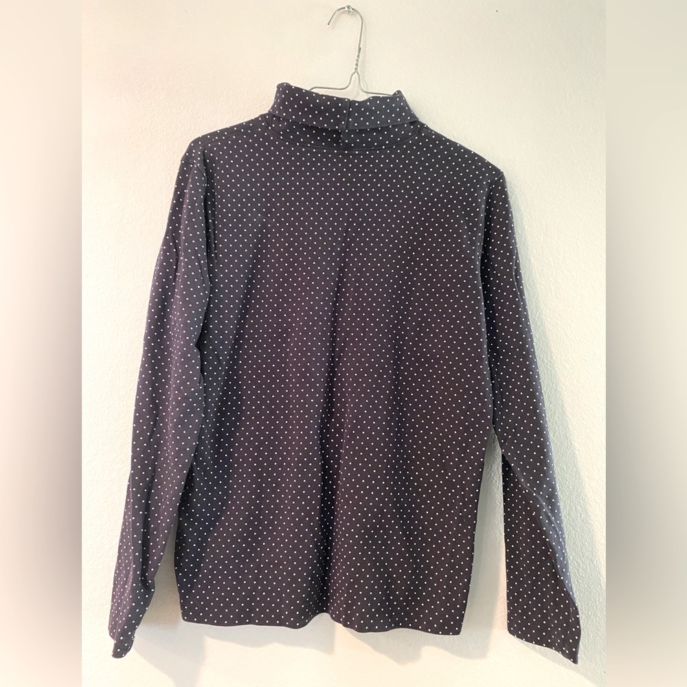 Blue and white polka dot turtle neck sweater